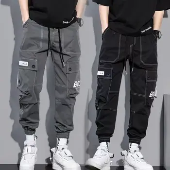 Klasszikus Streetwear alkalmi férfi szalagok hárem kocogó nadrág férfi slim fit tavaszi cargo nadrág többzsebes női nadrág X95