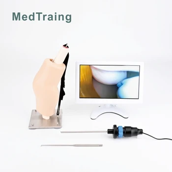 Artroszkópos műtét szimulálása HD kamerával, műszerrel, térdmodullal és monitorral