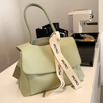 Női válltáskák 2023 Új egyszínű PU bőr alkalmi nagy kapacitású kézitáskák Divatmárka tervezők Luxus táskák