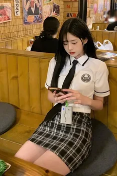 Japán és koreai stílusú főiskolai stílusú iskolai jelmezruha magas derékú csípőpántos szoknya lány Jk egyenruha napi kétrészes Jk szett